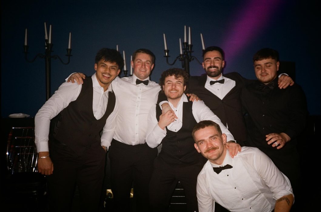 The team at a black-tie awards night